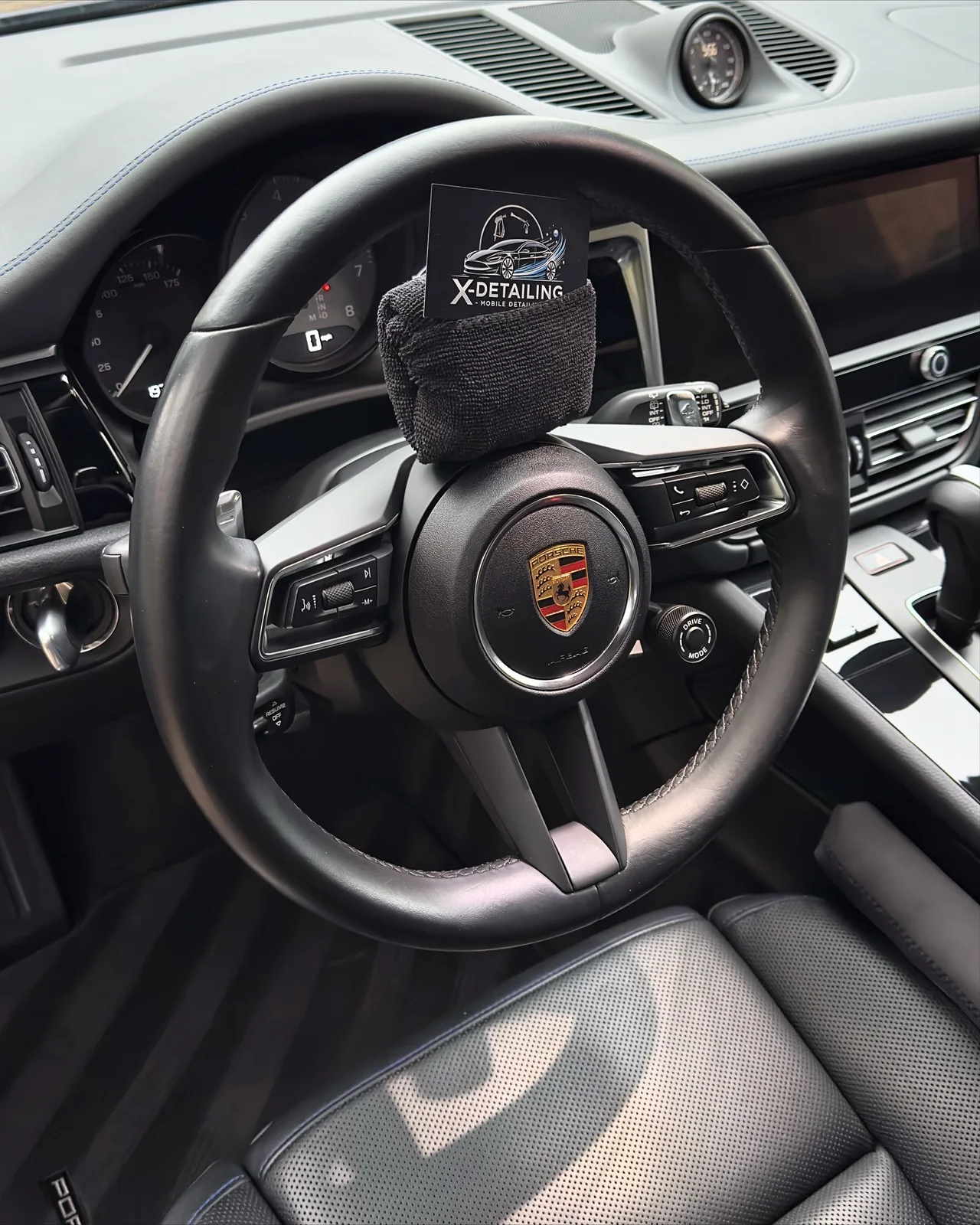 Porsche Macan S finished steering wheel and cockpit after interior detailing in Suwanee GA