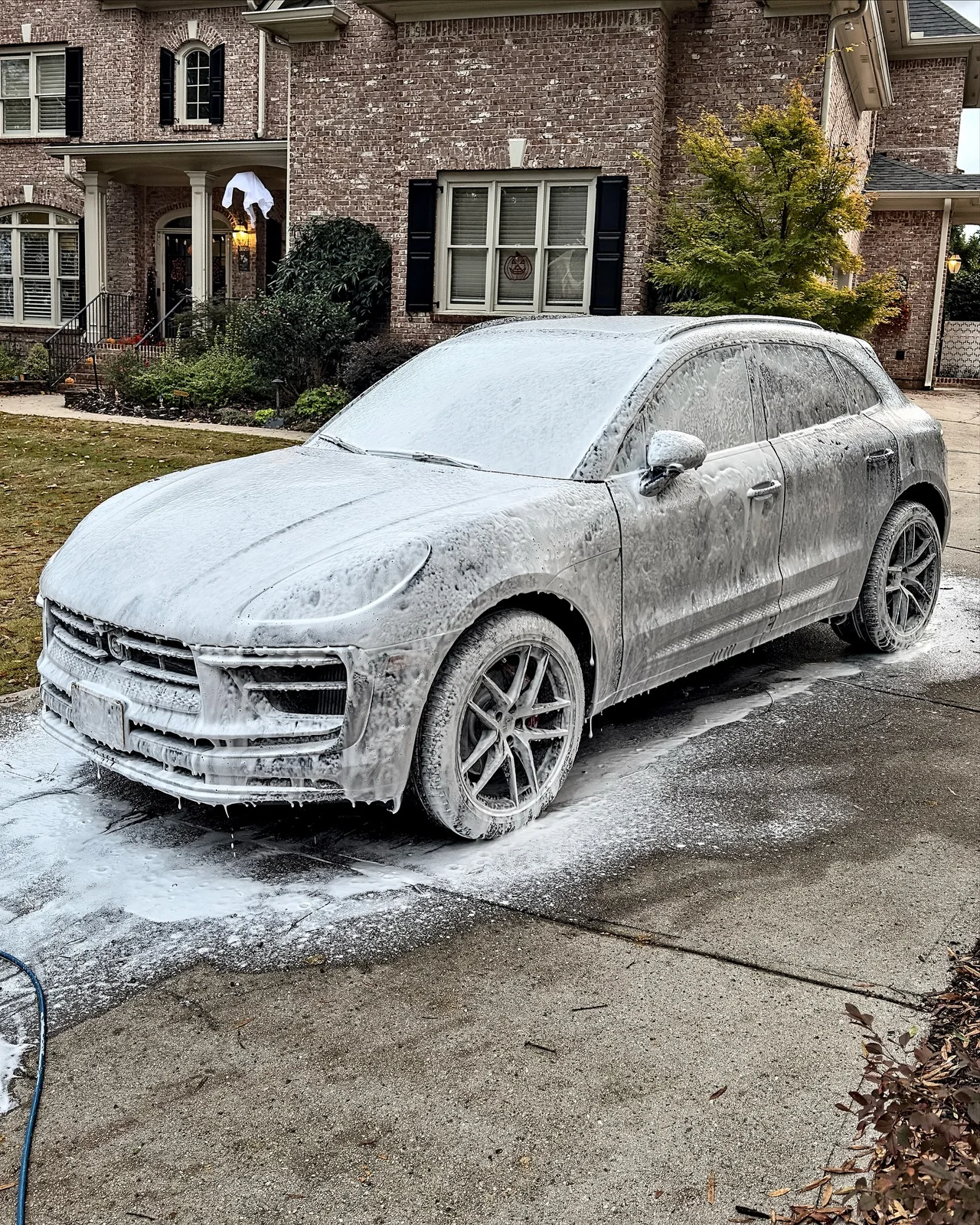 Porsche Macan S during foam wash at a Suwanee mobile detailing appointment